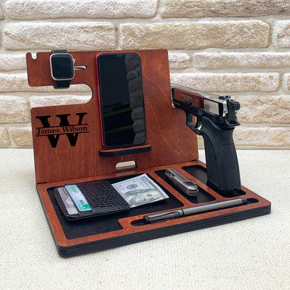 Personalized wooden nightstand valet with custom engraved thing blue line flag with batch number. Personalized gifts for police officer which include holders for an Apple Watch, smartphone, wallet, pen, and a dedicated slot for a handgun. The stand is organized to keep everyday carry items neatly in place. ideal gifts for law enforcement, police retirement and the one who have gun. 