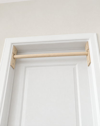 Single-Level Venocci wooden doorway bar installed inside a white door frame